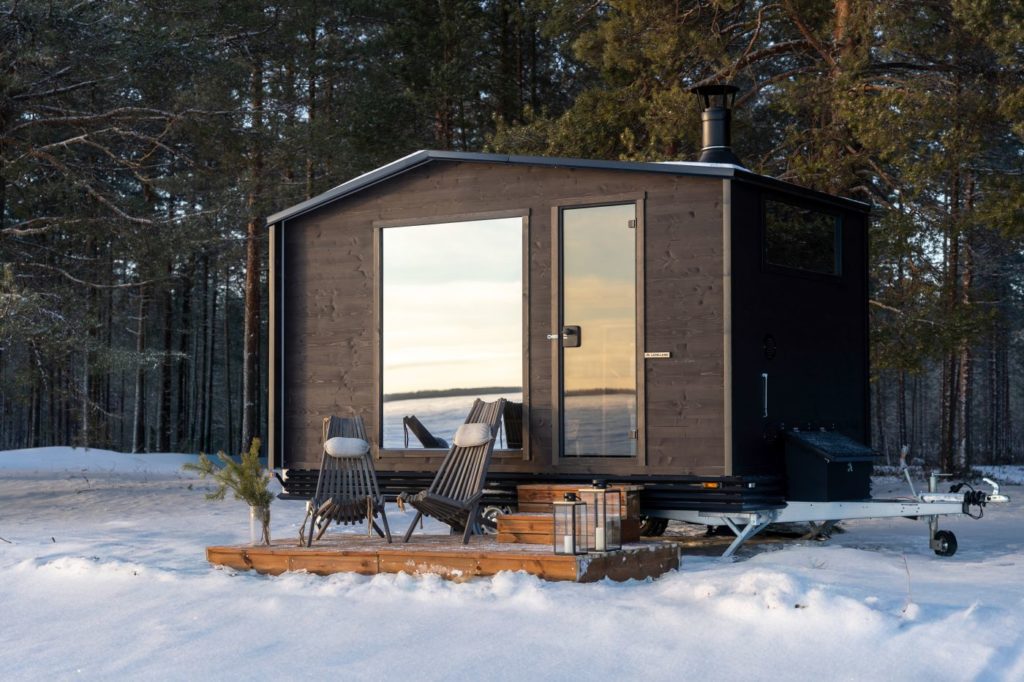 Sauna Genève – Authentic Nordic sauna experience Finnish sauna provides a relaxing atmosphere in winter exterior with deck