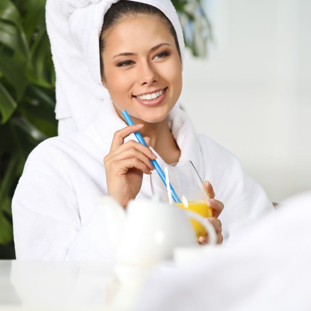 Woman relaxing after sauna session